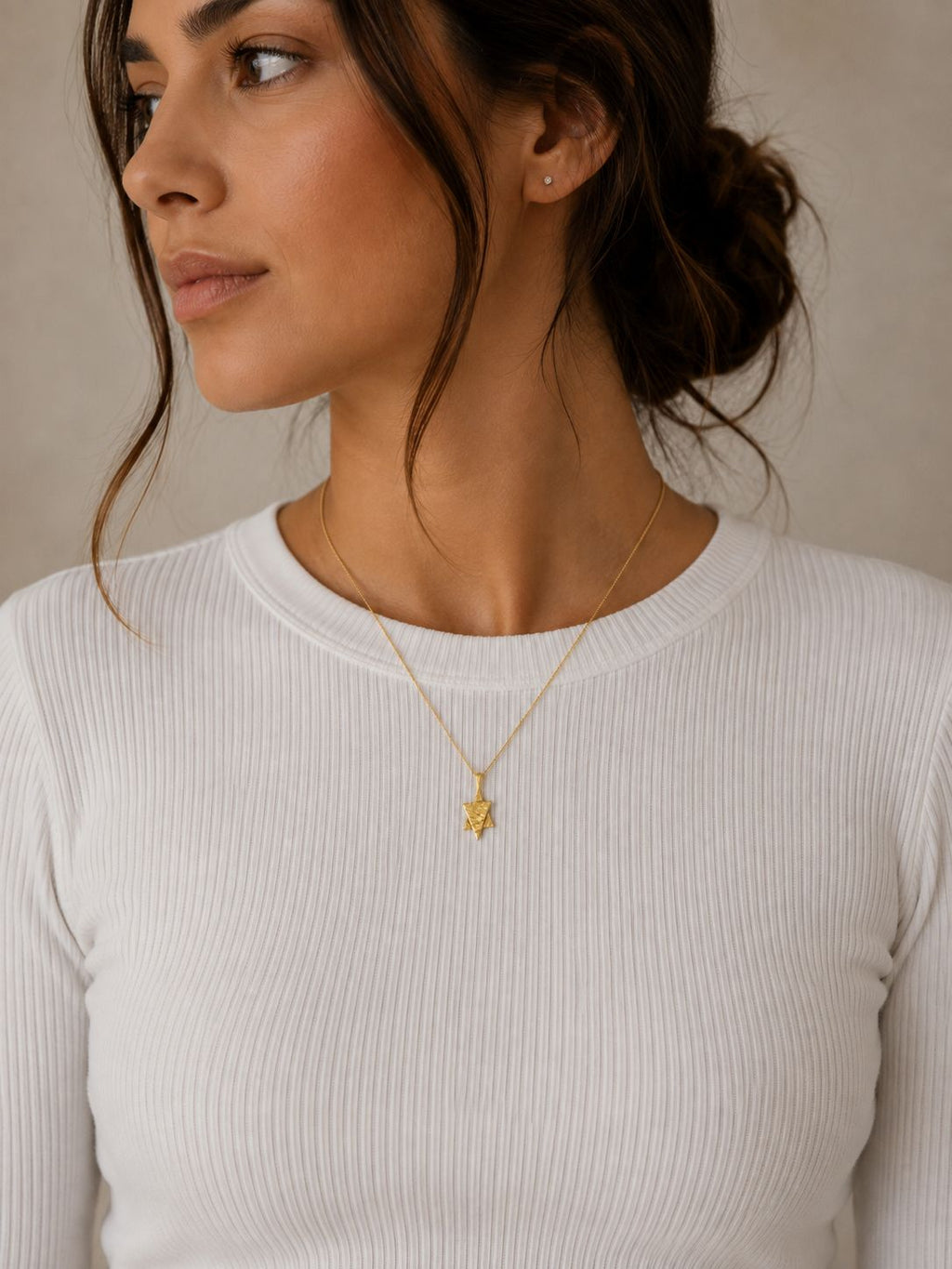 Up & Down pendant in gold — on model
